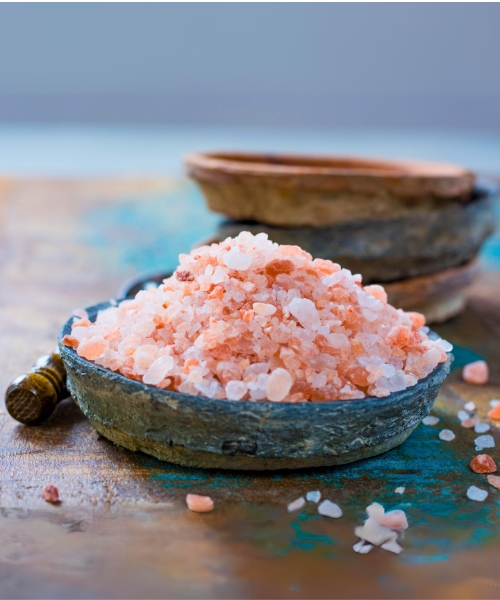 Salt in form of crystals in a bowl.